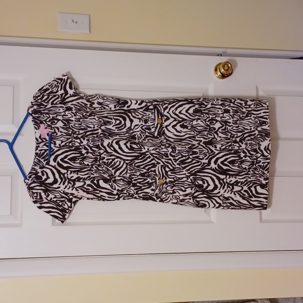 Lilly Pulitzer, sz S, brown & cream short sleeve dress in a tropical print.